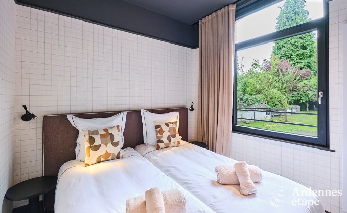 Charmante maison de vacances  Spa avec 2 chambres, espace de dtente et terrasse prive avec jacuzzi