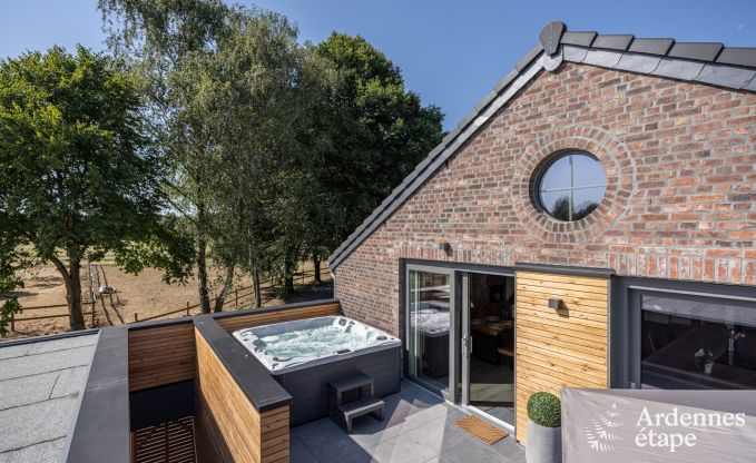 Maison confortable  Welkenraedt pour 6 personnes avec jacuzzi, quipements de jeux et jardin priv